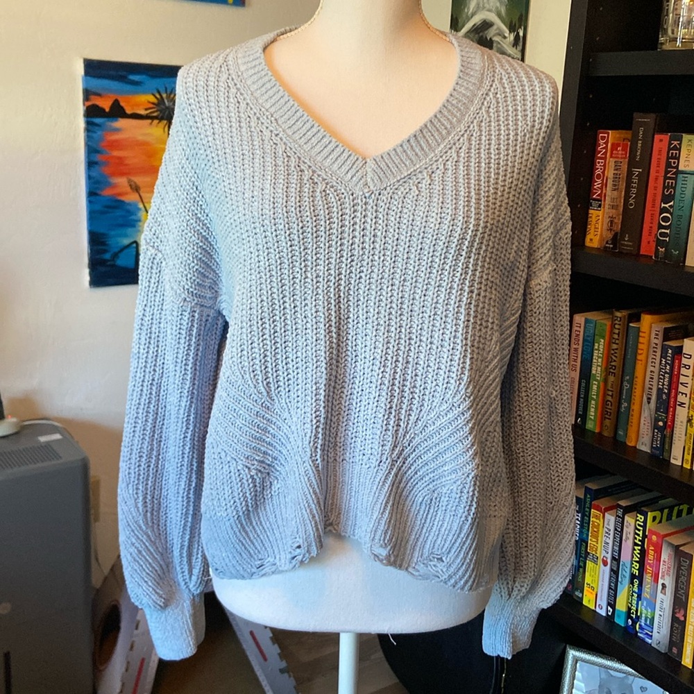 Light blue ripped knitted crop top